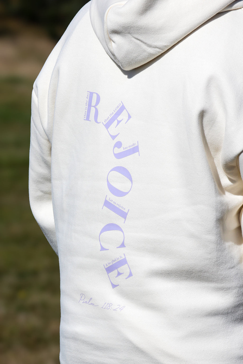 Close up of the back of the Sons and Daughters Rejoice Hoodie in Ivory